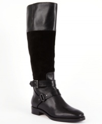 A tapered toe lends sophistication to Joan & David's Zadarah single-sole tall boots. They feature a zipper closure on the side and buckled straps around the ankle. A tapered toe lends sophistication to Joan & David's Zadarah single-sole tall boots. They feature a zipper closure on the side and buckled straps around the ankle.