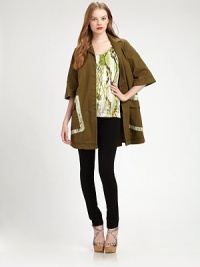A-line, cotton-rich topper with oversized patch pockets and python-print trim. Notched collarThree-quarter sleevesHidden button frontPatch pocketsFully linedAbout 33 from natural waist96% cotton/4% elastaneDry cleanMade in Italy of imported fabricModel shown is 5'9½ (176cm) wearing US size 4. A-line, cotton-rich topper with oversized patch pockets and python-print trim. Notched collarThree-quarter sleevesHidden button frontPatch pocketsFully linedAbout 33 from natural waist96% cotton/4% elastaneDry cleanMade in Italy of imported fabricModel shown is 5'9½ (176cm) wearing US size 4.