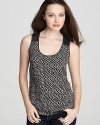 This VINCE CAMUTO tank is designed to delight both coming and going with an abstract checkered front and micro-dot patterned back.