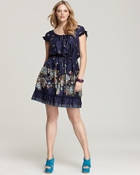 Delicate blossoms dart across this Johnny Was Collection Plus dress for a feminine addition to your summer repertoire. Delicate blossoms dart across this Johnny Was Collection Plus dress for a feminine addition to your summer repertoire.