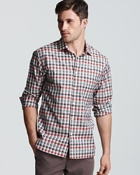 A classic check design spruces up your casual cool look with this handsome button-down from Billy Reid. A classic check design spruces up your casual cool look with this handsome button-down from Billy Reid.