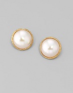 Lustrous white mabé pearls create a look that's simple, timeless and lovely. 16mm organic man-made pearls 18k goldplated sterling silver Clip-on back Made in Spain