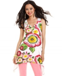 A burst of florals make a bright summer statement on this Desigual tunic -- perfect over colored skinny jeans!