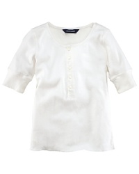 A classic Henley shirt is rendered in luxuriously soft cotton. A classic Henley shirt is rendered in luxuriously soft cotton.