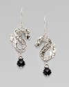 From the Naga Collection. Slightly ferocious but oh so stylish, these S-shaped dragons hold faceted drops of black chalcedony.Black chalcedonySterling silverDrop, about 2¼Ear wireImported