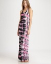 Bright, tie-dyed motif covers a fitted jersey silhouette styled with a plunging scoopneck, racerback and touch of silk. ScoopneckSleevelessRacerbackAbout 40 from natural waist90% micro modal/10% silkDry cleanMade in USAModel shown is 5'10 (177cm) wearing US size Small.