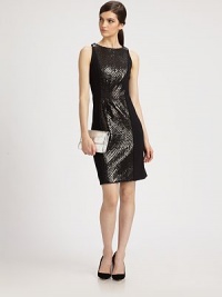 The perfect combination of sleek and sexy, all in a contour-hugging cotton sheath offset by a snakeskin-inspired front panel.JewelneckSleevelessTop-fit bodiceSet-in waistCenter back zipperAbout 22 from natural waist90% cotton/10% viscoseDry cleanMade in USA of Italian fabricModel shown is 5'9½ (176cm) wearing US size 4. The perfect combination of sleek and sexy, all in a contour-hugging cotton sheath offset by a snakeskin-inspired front panel.JewelneckSleevelessTop-fit bodiceSet-in waistCenter back zipperAbout 22 from natural waist90% cotton/10% viscoseDry cleanMade in USA of Italian fabricModel shown is 5'9½ (176cm) wearing US size 4.