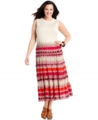 Punch up your style this season with Elementz' plus size maxi skirt, featuring a spirited print and tiered design. Punch up your style this season with Elementz' plus size maxi skirt, featuring a spirited print and tiered design.