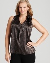 Rolling ruffles enliven a sleek snakeskin-print Tahari Woman Plus blouse for fierce fashion presence.