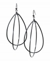 Dangle these large GUESS teardrop earrings from your ears for a dazzling effect. Crafted in silvertone mixed metal.  Approximate drop: 3 inches.