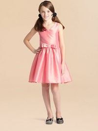 Rendered in eye-catching taffeta, this simply elegant v-neck frock features a pretty bow detail and full skirt, perfect for twirling and dancing the night away.V-neckSleevelessBack zipperBanded waist with bowFull skirtFully linedPolyesterDry cleanMade in the USA Rendered in eye-catching taffeta, this simply elegant v-neck frock features a pretty bow detail and full skirt, perfect for twirling and dancing the night away.V-neckSleevelessBack zipperBanded waist with bowFull skirtFully linedPolyesterDry cleanMade in the USA