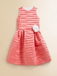 She'll be the belle of the ball in this vivid, pleated frock with rosette detail and plenty of charm.JewelneckSleevelessBack zipperPleated, full skirtPolyesterDry cleanMade in the USA She'll be the belle of the ball in this vivid, pleated frock with rosette detail and plenty of charm.JewelneckSleevelessBack zipperPleated, full skirtPolyesterDry cleanMade in the USA