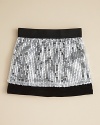A ready-to-party sequin skirt from Sofi that frames the action with contrast bands at the waist and hem.
