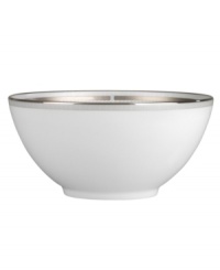 Crisp printed tulle drapes white bone china in sheer elegance. With polished platinum banding, this contemporary gift bowl ensures immaculate home dining.