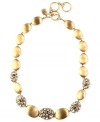 With added crystal sparkle, this collar necklace from Jones New York features golden nugget-inspired links. Crafted in worn gold tone mixed metal. Approximate length: 17 inches + 3-inch extender.