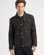 Featuring a classic plaid and signature Alexander Wang tailoring, a brilliant three-pocket jacket.Button frontDropped shouldersButtoned cuffsFront pocketsFully linedAbout 27 from shoulder to hem80% wool/10% polyester/10% nylonDry cleanImported