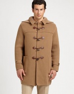 Impeccably crafted in Italy from luxurious wool, this cold weather essential exudes a modern sensibility with a point collar and attached hood, finished with leather-accented toggle closure for a heritage-inspired feel.Toggle closureAttached hoodWaist patch pocketsAbout 35 from shoulder to hemWoolDry cleanMade in Italy