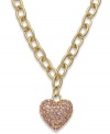 Accessorize to your heart's desire. Charter Club's adorable heart pendant features pretty pink crystals in gold tone mixed metal. Approximate length: 16-1/2 inches + 3-inch extender. Approximate drop: 1 inch. Item comes packaged in a signature box.