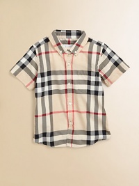Fashioned in the renowned check design, this breezy cotton button-down features a shirttail hem and patch pocket.Button-down collarShort sleevesButton-frontFront patch pocketShirttail hemCottonMachine washImported Please note: Number of buttons may vary depending on size ordered. Fashioned in the renowned check design, this breezy cotton button-down features a shirttail hem and patch pocket.Button-down collarShort sleevesButton-frontFront patch pocketShirttail hemCottonMachine washImported Please note: Number of buttons may vary depending on size ordered.