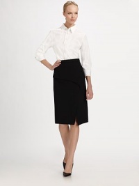 Beautifully tailored, smart cotton, accented with an embroidered monogram at the cuff.Pointed collarThree-quarter sleevesButton frontButton cuffBack yokeSignature embroidery at cuffAbout 25 from shoulder to hemCottonDry cleanMade in Italy of imported fabric Model shown is 5'11 (180cm) wearing US size 4. Beautifully tailored, smart cotton, accented with an embroidered monogram at the cuff.Pointed collarThree-quarter sleevesButton frontButton cuffBack yokeSignature embroidery at cuffAbout 25 from shoulder to hemCottonDry cleanMade in Italy of imported fabric Model shown is 5'11 (180cm) wearing US size 4.