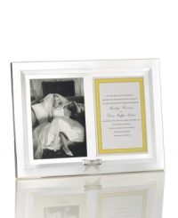 Frame a wedding invitation and photo together with the silver-plated Grace Avenue picture frame from kate spade.. A pewter ribbon ties it all together with preppy, feminine charm.