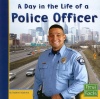A Day in the Life of a Police Officer (First Facts: Community Helpers at Work)
