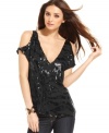 Go glam in this high-shine sequined MM Couture top, perfect for a sultry night on the town!