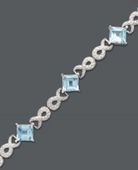 Brilliance in blue. Victoria Townsend's glamorous tennis bracelet dazzles with square-cut blue topaz (9 ct. t.w.) and sparkling diamond accents. Crafted in sterling silver. Approximate length: 7-1/4 inches.