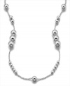 An alluring mix of sizes adds chicness and a sense of fun to this chain necklace from Lauren by Ralph Lauren. In silvertone mixed metal. Measures approximately 36 inches long.