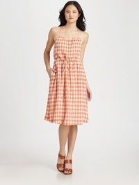 Picnic-chic squareneck has a spaghetti strap halter, flattering self tie at the waist and unanticipated slash pockets. SquareneckSpaghetti strap halterSelf tie at waistSlash pocketsAbout 26 from natural waist99% cotton/1% elastaneDry cleanMade in USA of imported fabricModel shown is 5'9 (175cm) wearing US size 4. Picnic-chic squareneck has a spaghetti strap halter, flattering self tie at the waist and unanticipated slash pockets. SquareneckSpaghetti strap halterSelf tie at waistSlash pocketsAbout 26 from natural waist99% cotton/1% elastaneDry cleanMade in USA of imported fabricModel shown is 5'9 (175cm) wearing US size 4.