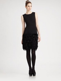 Fun and fabulous, this flirty frock combines a smooth knit top with a fluffy feathered skirt for a get-you-noticed look.Round necklineSleevelessDropped waistExposed back zipperSlim feathered skirtAbout 21 from natural waistViscose/nylon/spandexDry cleanImportedSIZE & FITModel shown is 5'9 (175cm) wearing US size Small. Fun and fabulous, this flirty frock combines a smooth knit top with a fluffy feathered skirt for a get-you-noticed look.Round necklineSleevelessDropped waistExposed back zipperSlim feathered skirtAbout 21 from natural waistViscose/nylon/spandexDry cleanImportedSIZE & FITModel shown is 5'9 (175cm) wearing US size Small.
