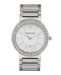 Clean, modern lines revolutionize the classic shape of this Citra watch by Swarovski. Stainless steel bracelet and round case. Bezel accented with crystal pave. White sunray dial features silver tone stick indices, date window at six o'clock, logo at twelve o'clock and two hands. Swiss quartz movement. Water resistant to 30 meters. Two-year limited warranty. Clean, modern lines revolutionize the classic shape of this Citra watch by Swarovski. Stainless steel bracelet and round case. Bezel accented with crystal pave. White sunray dial features silver tone stick indices, date window at six o'clock, logo at twelve o'clock and two hands. Swiss quartz movement. Water resistant to 30 meters. Two-year limited warranty.
