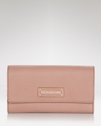 Style your look MARC BY MARC JACOBS down to the essentials, like this leather wallet. Its blocked leather taps the tonal trend, while its organized interior is fully functional. Style your look MARC BY MARC JACOBS down to the essentials, like this leather wallet. Its blocked leather taps the tonal trend, while its organized interior is fully functional.