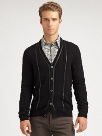 Cool-weather layering never looked so good, and adding this button-front cardigan is a sure-fire way to beat the chill in style; neatly woven in pure virgin wool with a sleek leather trim for a modern contrast.Button-frontRibbed knit cuffs and hemChest welt, hip flap pocketsRear ventAbout 37 from shoulder to hemPure virgin woolMachine washMade in Italy Cool-weather layering never looked so good, and adding this button-front cardigan is a sure-fire way to beat the chill in style; neatly woven in pure virgin wool with a sleek leather trim for a modern contrast.Button-frontRibbed knit cuffs and hemChest welt, hip flap pocketsRear ventAbout 37 from shoulder to hemPure virgin woolMachine washMade in Italy