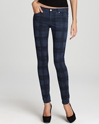 Paige Denim puts a preppy spin on their sleek skinny jeans with a punchy plaid print. Paige Denim puts a preppy spin on their sleek skinny jeans with a punchy plaid print.