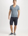 Contrasting stripes and an unfinished hem add some cool style to this comfortable v-neck design. V-neckShort sleevesUnfinished hemlineAbout 28 from shoulder to hem61% polyester/24% cotton/15% linenMachine washImported