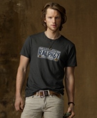 Capturing the spirit of adventure that defines Denim & Supply's signature style, a goes-with-everything cotton jersey tee is emboldened with a weathered license plate graphic. Capturing the spirit of adventure that defines Denim & Supply's signature style, a goes-with-everything cotton jersey tee is emboldened with a weathered license plate graphic.