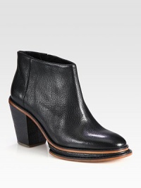 Pebble-grain leather and contrast piping form this short silhouette resting on a chunky heel. Self-covered heel, 3¾ (95mm)Island platform, ¾ (20mm)Compares to a 3 heel (75mm)Leather upperSide zipLeather lining and solePadded insoleImported Pebble-grain leather and contrast piping form this short silhouette resting on a chunky heel. Self-covered heel, 3¾ (95mm)Island platform, ¾ (20mm)Compares to a 3 heel (75mm)Leather upperSide zipLeather lining and solePadded insoleImported