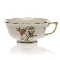 Birds and butterflies are hand-painted by experienced artisans, expressing a nature-inspired beauty that's augmented by gold accents for classic sophistication. Birds and butterflies are hand-painted by experienced artisans, expressing a nature-inspired beauty that's augmented by gold accents for classic sophistication.