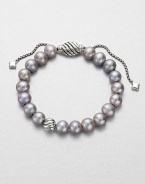 From the Spiritual Bead Collection. Luminous grey freshwater pearls on a sterling silver box chain with sterling silver cabled bead accents. 8mm grey freshwater pearlsSterling silverDiameter, about 7.75 adjustableBead closureImported 