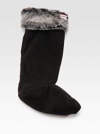 Comfy-cozy classic topped with a plush cuff. 75% acrylic/25% polyester cuffPolyesterHand washImported Comfy-cozy classic topped with a plush cuff. 75% acrylic/25% polyester cuffPolyesterHand washImported