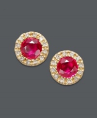 Add spark to your style with these red-hot, Effy Collection stud earrings! Brilliant rubies (7/8 ct. t.w.) create a bold background when encircled with sparkling, round-cut diamonds (1/8 ct. t.w.). Crafted in 14k gold. Approximate diameter: 1/4 inch. Add spark to your style with these red-hot, Effy Collection stud earrings! Brilliant rubies (7/8 ct. t.w.) create a bold background when encircled with sparkling, round-cut diamonds (1/8 ct. t.w.). Crafted in 14k gold. Approximate diameter: 1/4 inch.