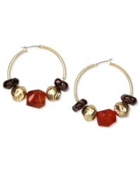 Shake up your style with Jones New York. These alluring hoops feature clusters of resin beads. Finished with a click-it closure. Crafted in worn gold tone mixed metal. Approximate diameter: 1-1/2 inches. Shake up your style with Jones New York. These alluring hoops feature clusters of resin beads. Finished with a click-it closure. Crafted in worn gold tone mixed metal. Approximate diameter: 1-1/2 inches.