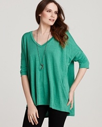 Seeped in a deep turquoise hue, this Eileen Fisher pullover flaunts flattering dolman sleeves. Add statement jewelry for a look that reads boho-chic. Seeped in a deep turquoise hue, this Eileen Fisher pullover flaunts flattering dolman sleeves. Add statement jewelry for a look that reads boho-chic.