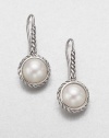 Luminous pearl drops, suspended from and framed by sterling silver cables. White pearls Sterling silver Drop, about ½ Ear wire Imported
