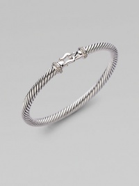 From the Cable Buckle Collection. A signature cable of sterling silver in a graceful bangle with a buckle clasp, accented with pavé diamonds. Diamonds, .10 tcw Sterling silver Cable, 5mm Diameter, about 2¼ Hook clasp Made in USA From the Cable Buckle Collection. A signature cable of sterling silver in a graceful bangle with a buckle clasp, accented with pavé diamonds. Diamonds, .10 tcw Sterling silver Cable, 5mm Diameter, about 2¼ Hook clasp Made in USA
