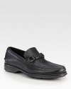 Pebbled calfskin leather slip-on with gancini strap ornament and comfortable rubber sole.Leather upperLeather liningPadded insoleRubber soleMade in Italy