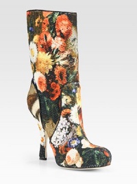 Rich floral brocade fabric trimmed with smooth leather forms this sky-high design. Self-covered heel, 5 (125mm)Shaft, 10Leg circumference, 13Brocade fabric upper with leather trimPull-on styleLeather lining and solePadded insoleMade in Italy Rich floral brocade fabric trimmed with smooth leather forms this sky-high design. Self-covered heel, 5 (125mm)Shaft, 10Leg circumference, 13Brocade fabric upper with leather trimPull-on styleLeather lining and solePadded insoleMade in Italy