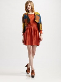 Cropped, wool-rich topper in a bold, multicolored pattern with an uneven, notched back hem and three-quarter sleeves. V-neckHook-and-eye closureDropped shouldersThree-quarter sleevesNotched back hemAbout 16 from shoulder to hem73% wool/27% polyesterDry cleanMade in USA of Italian fabricModel shown is 5'9½ (176cm) wearing US size 2. Cropped, wool-rich topper in a bold, multicolored pattern with an uneven, notched back hem and three-quarter sleeves. V-neckHook-and-eye closureDropped shouldersThree-quarter sleevesNotched back hemAbout 16 from shoulder to hem73% wool/27% polyesterDry cleanMade in USA of Italian fabricModel shown is 5'9½ (176cm) wearing US size 2.