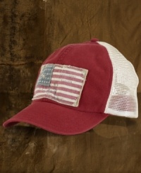 A baseball hat with cotton and mesh panels for breathability gets a vintage feel from a distressed flag patch at the front. A baseball hat with cotton and mesh panels for breathability gets a vintage feel from a distressed flag patch at the front.